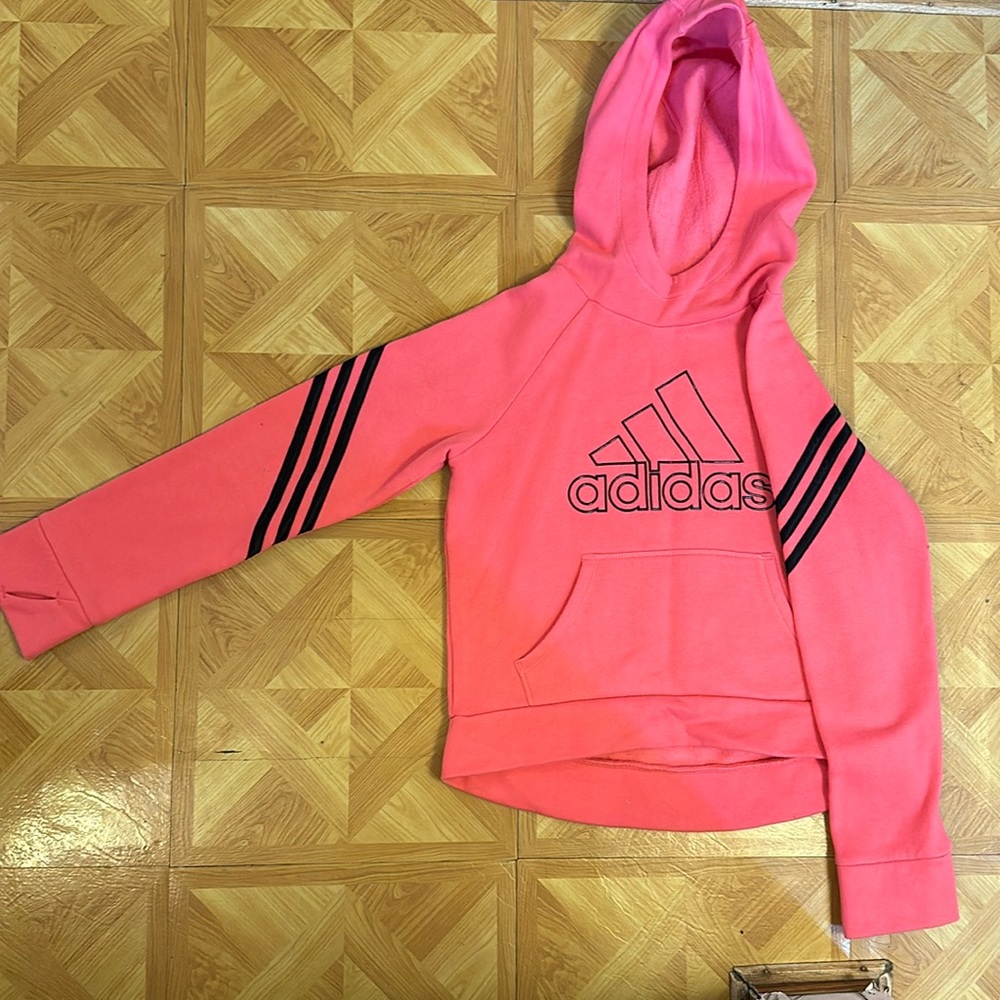 This is an adidas kids hoodie in medium 10/12. It’s comfy and unworn!